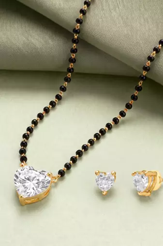 Women's golden toned heart solitaire mangalsutra & stud earring set