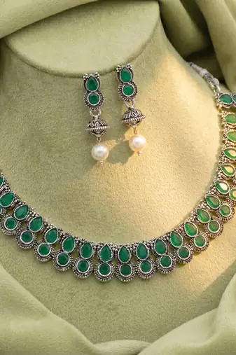 Green oxidised necklace earrings set for women faux emerald studded |