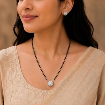 Silver toned round solitaire black beaded mangalsutra with earrings 1