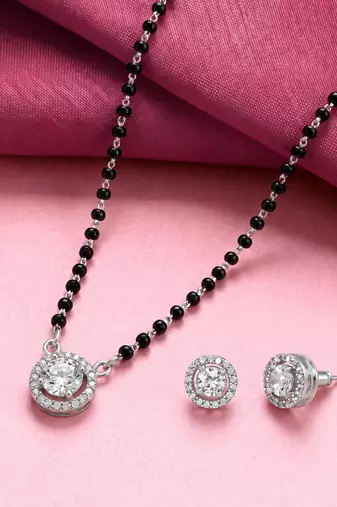 Silver toned round solitaire black beaded mangalsutra with earrings