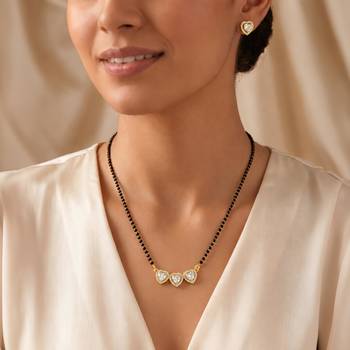 Womens golden toned heart mangalsutra necklace & earrings set 1