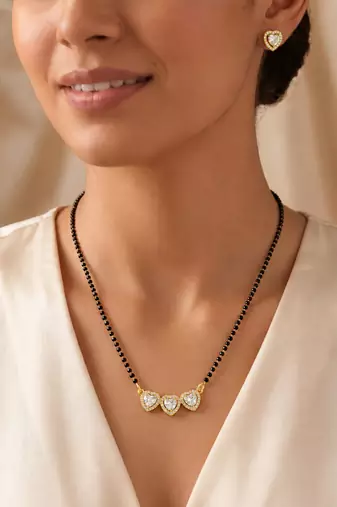 Womens golden toned heart mangalsutra necklace & earrings set