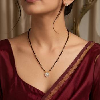 Women's golden toned floral mangalsutra & stud earring jewelry set 1