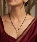 Women's golden toned floral mangalsutra & stud earring jewelry set