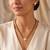 Women's brass golden toned round drop mangalsutra & earring  set