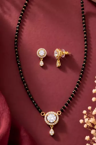 Women's brass golden toned round drop mangalsutra & earring  set