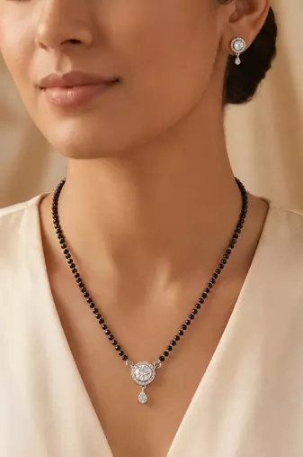 Women's brass silver toned round drop mangalsutra & earring  set