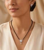 Women's brass silver toned round drop mangalsutra & earring  set