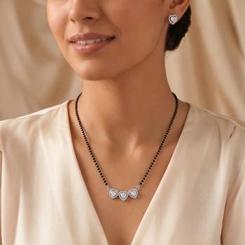 Womens silver toned heart mangalsutra necklace & earrings set 1