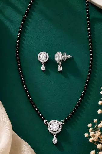 Women's brass silver toned round drop mangalsutra & earring  set