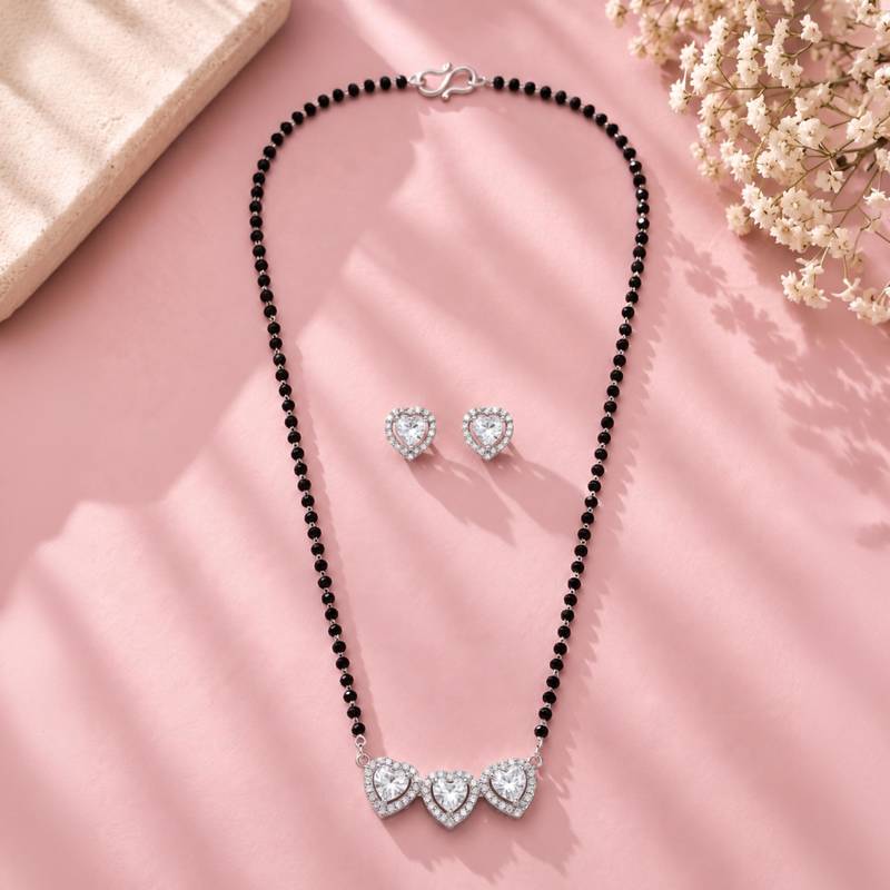 Womens silver toned heart mangalsutra necklace & earrings set