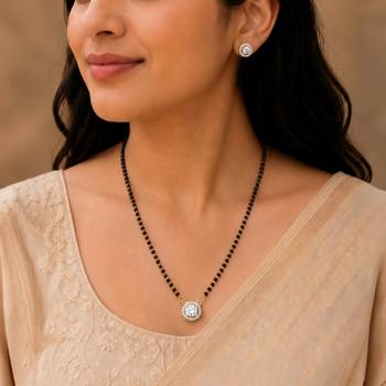 Round solitaire design black beaded mangalsutra with stud earrings 1