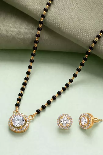 Round solitaire design black beaded mangalsutra with stud earrings