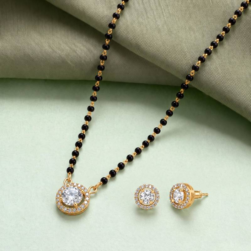 Round solitaire design black beaded mangalsutra with stud earrings