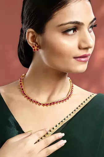 Women's rani pink synthetic stone studded necklace earrings bharatanatyam