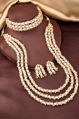 White beads studded long necklace & choker necklace with earrings