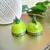 Green color ethnic quilled jhumkas