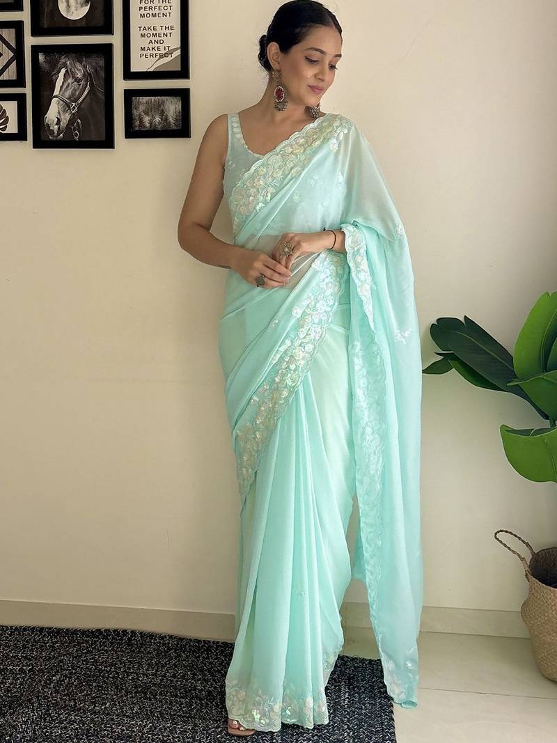 Blue solid embellished sequinned scallop border saree