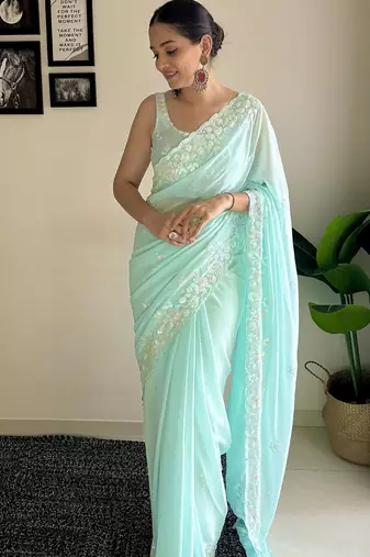 Blue solid embellished sequinned scallop border saree