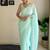 Blue solid embellished sequinned scallop border saree