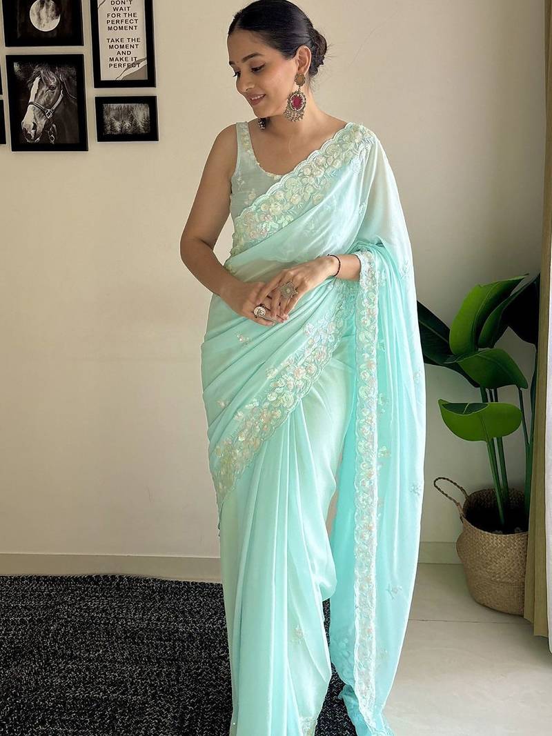 Blue solid embellished sequinned scallop border saree