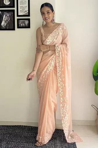 Peach ethnic motifs embroidered sequinned saree