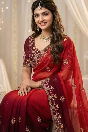 Red embellished embroidered poly georgette heavy work saree