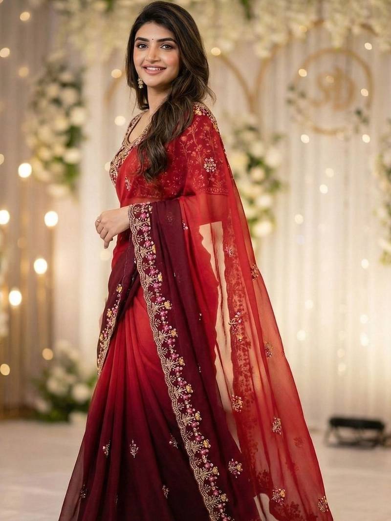 Red embellished embroidered poly georgette heavy work saree