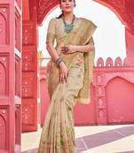 Beige floral woven design zari saree