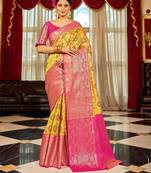Yellow ethnic motifs woven design zari banarasi saree