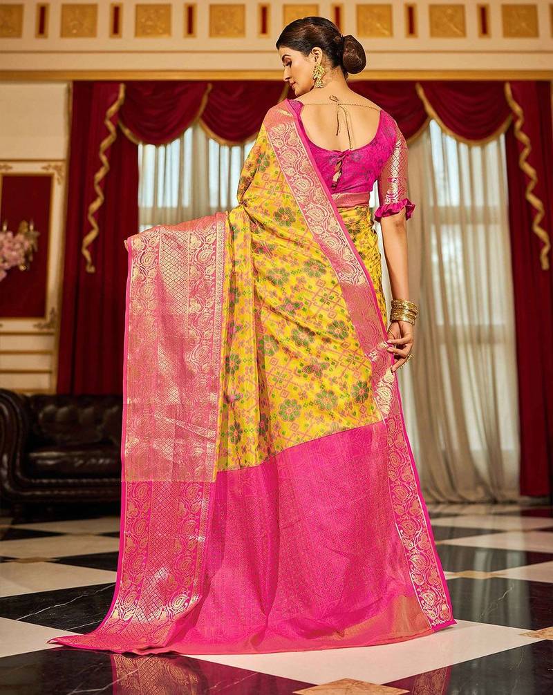 Yellow ethnic motifs woven design zari banarasi saree