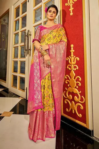 Yellow ethnic motifs woven design zari banarasi saree