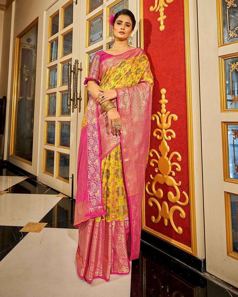 Yellow ethnic motifs woven design zari banarasi saree
