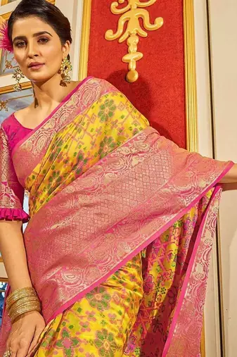 Yellow ethnic motifs woven design zari banarasi saree