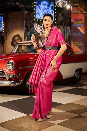 Pink ethnic woven design zari saree