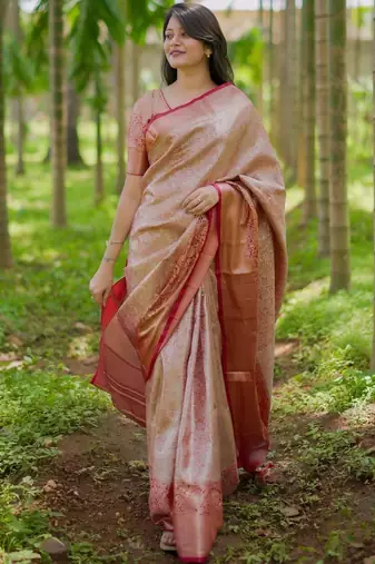 Peach woven design zari silk blend saree