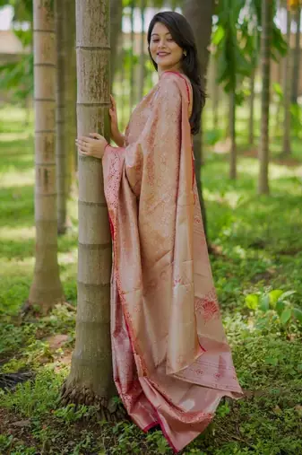 Peach woven design zari silk blend saree