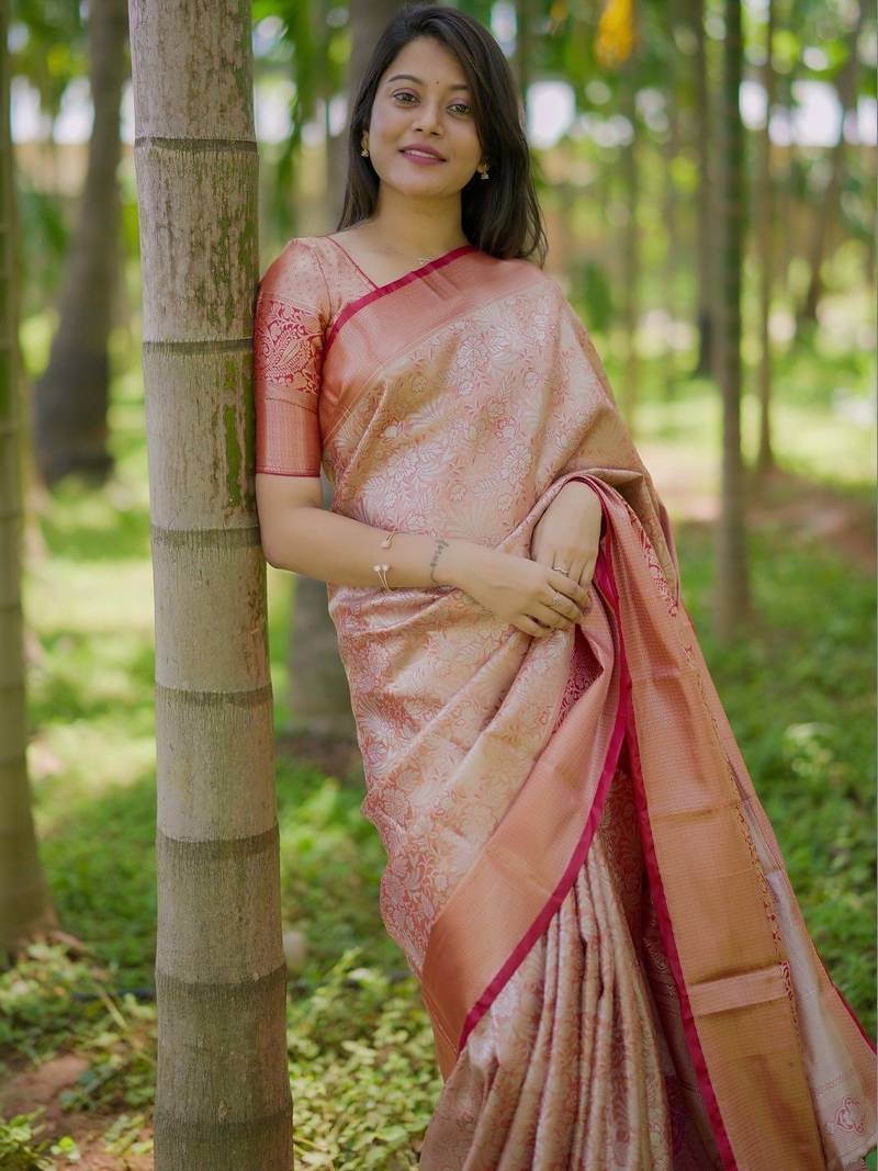 Peach woven design zari silk blend saree
