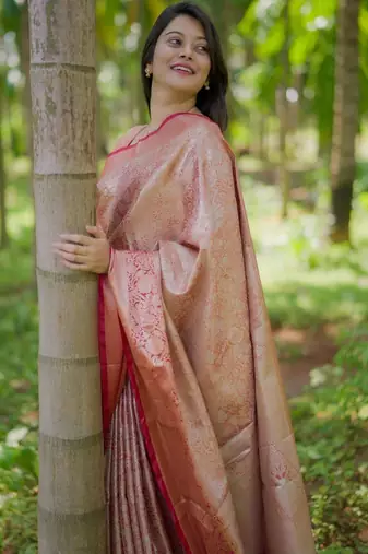 Peach woven design zari silk blend saree