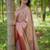 Peach woven design zari silk blend saree