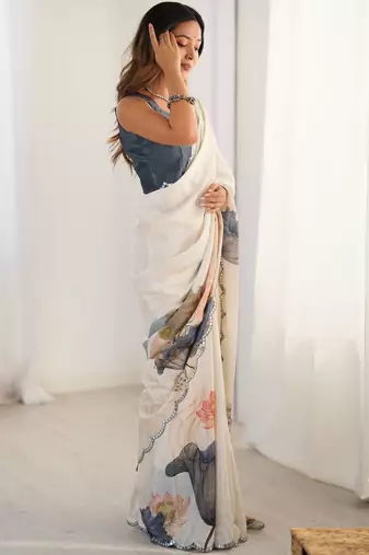Off white floral sequinned pure chiffon saree