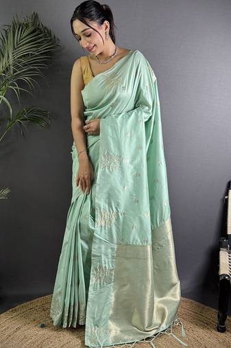 Sea green woven design soft lichi silk saree with flower weaving and matching blouse piece
