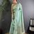 Sea green woven design soft lichi silk saree with flower weaving and matching blouse piece