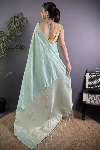 Sea green woven design soft lichi silk saree with flower weaving and matching blouse piece