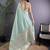 Sea green woven design soft lichi silk saree with flower weaving and matching blouse piece