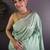Sea green woven design soft lichi silk saree with flower weaving and matching blouse piece