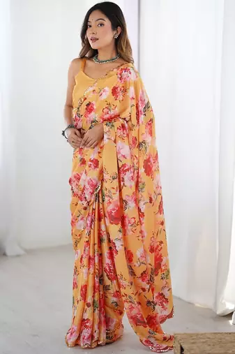 Yellow floral sequinned pure chiffon designer saree