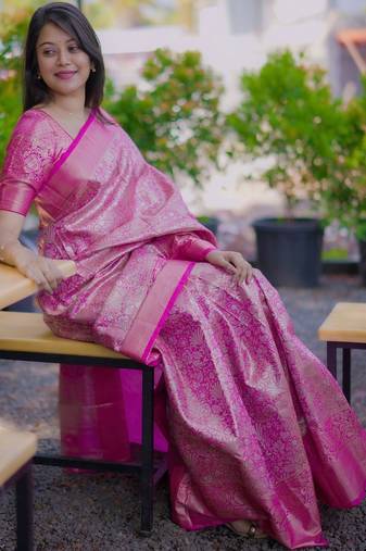 Pink woven design zari silk blend saree