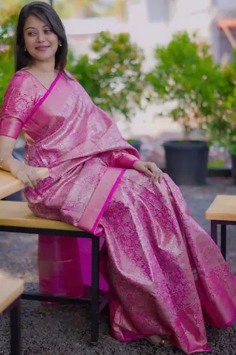Pink woven design zari silk blend saree