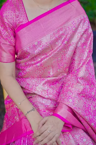 Pink woven design zari silk blend saree